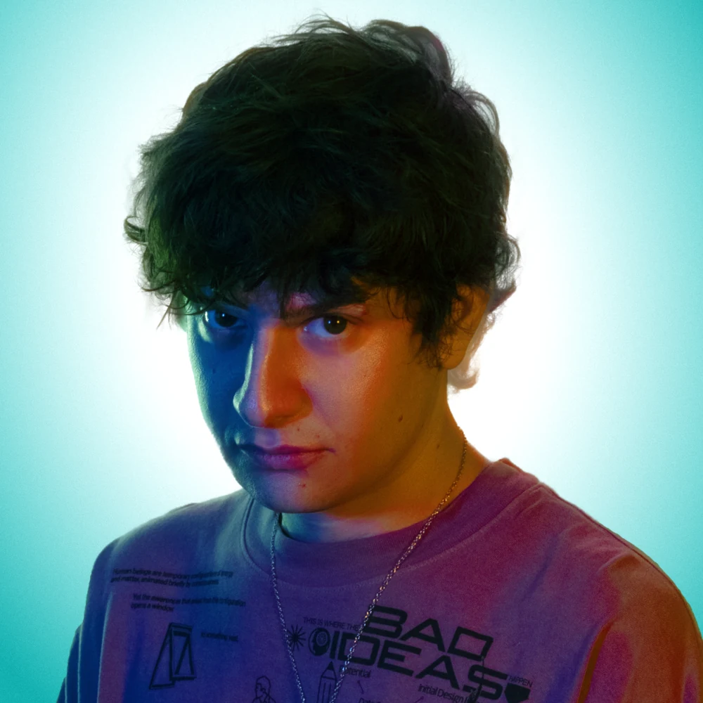 Omri close portrait in blue and orange light